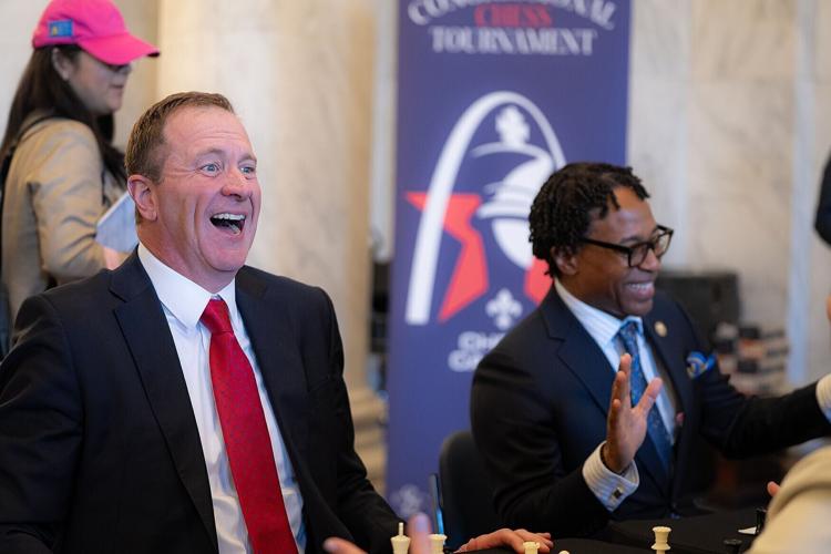 Sen. Eric Schmitt, R-Mo., left laughs with Rep. Wesley Bell, D-Mo