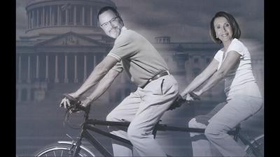 The negative ad features Dan Shaul, Missouri Senate District 22 candidate, riding a tandem bicycle with U.S. House Speaker Nancy Pelosi.