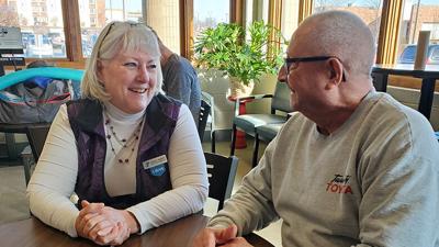 Debbie Siebert in the lobby of the Jefferson County Family YMCA with Ralph Bates of Festus, a member for about eight years.
