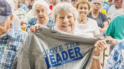 Peggy Peterson of Arnold wins a Leader T-shirt at the Arnold Senior Expo.