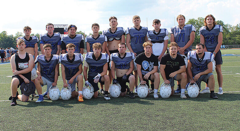 Youth football team gets Devon Still jerseys 