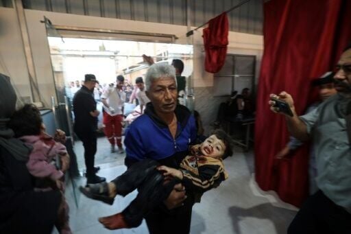 Casualties were brought into Al-Awda Hospital in the central Gaza Strip