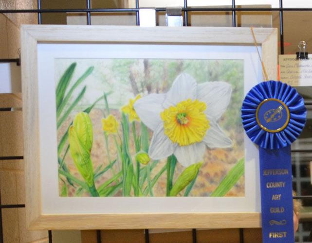 Sheila Michael of Barnhart took first place with her colored pencil piece depicting a jonquil.
