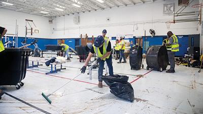 gym at Valley Middle School in House Springs following a flash flood.