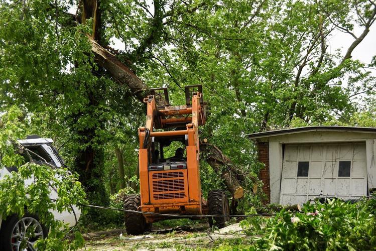 Residents of Glasgow clean up debris