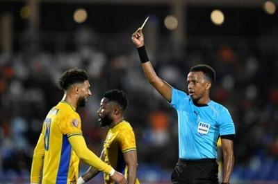 Somalia referee Omar Artan (R) will officiate at the 2026 World Cup finals