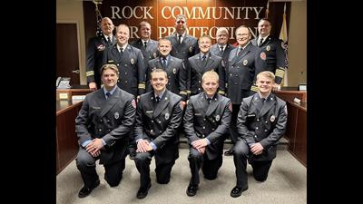 Rock Community Fire Protection District firefighters after a badge pinning ceremony on April 14 at House 5 in Arnold.
