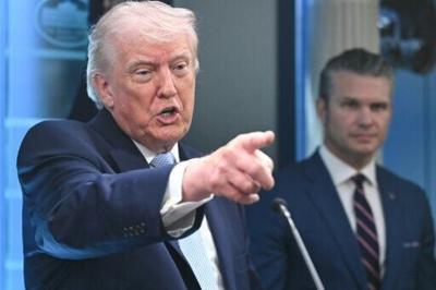 US President Donald Trump (left), pictured with Secretary of Defense Pete Hegseth (right), can veto war powers resolutions