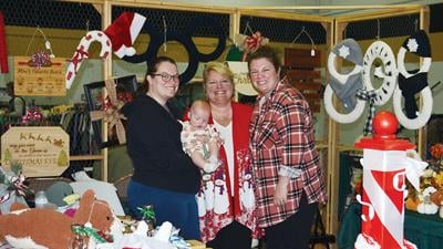 Pictured is Lori Loucks, center, with her daughters, Emily Schrader, left, and Samantha Goldsmith, and Loucks’ granddaughter, Jane, 4 months, all from Festus.