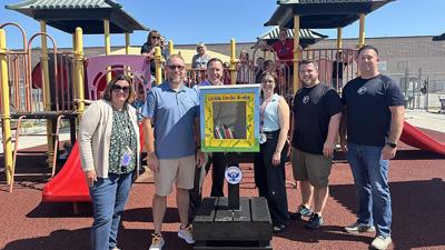 Members of F3 Jeffco, a men’s workout group, donated a book box to the Don Earl Early Childhood Center.
