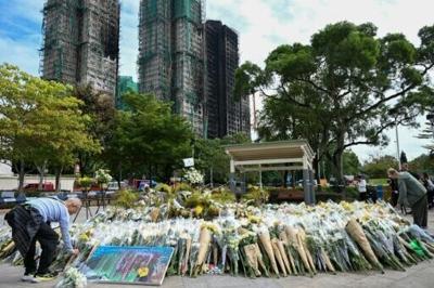 Hong Kong's leader says a judge-led committee will investigate the Wang Fuk Court fire that killed 151 people