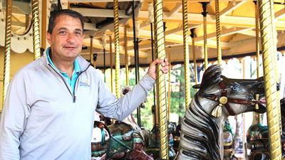 Enchanted Parks CEO James Harhi on the Grand Ole Carousel at Six Flags St. Louis, soon to be called Mid-America by Enchanted Parks.