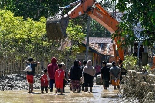Relentless rains left residents clinging to rooftops awaiting rescue by boat or helicopter, and cut off entire villages