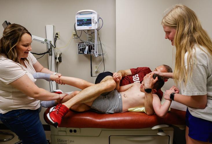 From left, Carter’s parents Amanda and Tom, and Mya Shorley-Gierer