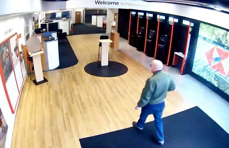 Bizarre moment man tries to rob bank armed with a vape