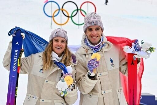 Thibault Anselmet and Emily Harrop won gold in the Olympic ski mountaineering mixed relay event