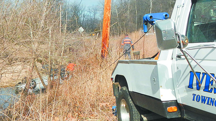 Overturned car at Seckman and West Outer roads