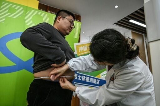 Slimmers are rewarded with expensive cuts like oxtail if they lose weight -- though the total amount of free meat is capped at 10 kilograms