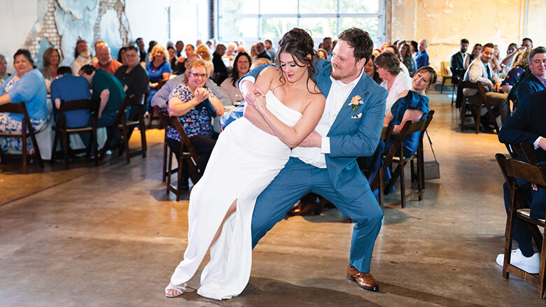 Steven and Stephanie Robertson dance at their wedding last May.
