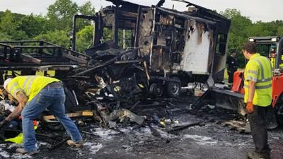 The remains of a pickup and camper that caught fire Thursday along I-44 outside Eureka.