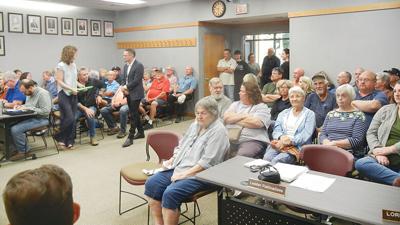 The Sept. 22 Festus City Council meeting drew a crowd from the meeting room into the lobby with the bulk of the turnout opposed to a proposed new housing development along Buck Creek Road on the western border of town.
