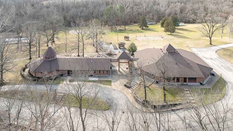 The Christian Outreach Church, left, and Christian Outreach School are located on the same campus in Goldman.