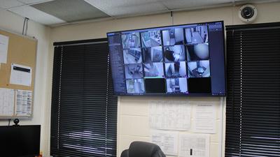 A monitor shows cameras located at various parts of the Jefferson County Jail. Cpl. Jeremy Rempel said some of the cameras are not working or have low video quality.