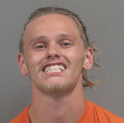 Man charged for allegedly striking another man with a car in High Ridge