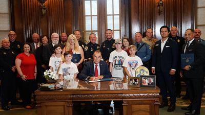 Byrnes Mill Police Sgt. Cody Umfress, Capt. Steve Schaffer, Cecilia Williams and her four grandchildren, Mason, Bentley, Jayce and Camden, were present July 9 when Gov. Mike Kehoe signed Mason and Bentley’s Law. The law is named after Mason and Bentley ...