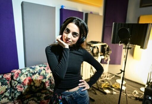 Romanian singer Bianca Mihai says she juggles a full-time job as an IT consultant with studio rehearsals and an acting gig