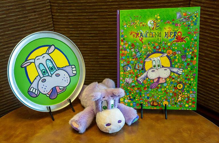“The Traveling Hippo” book, plate and stuffed hippo.