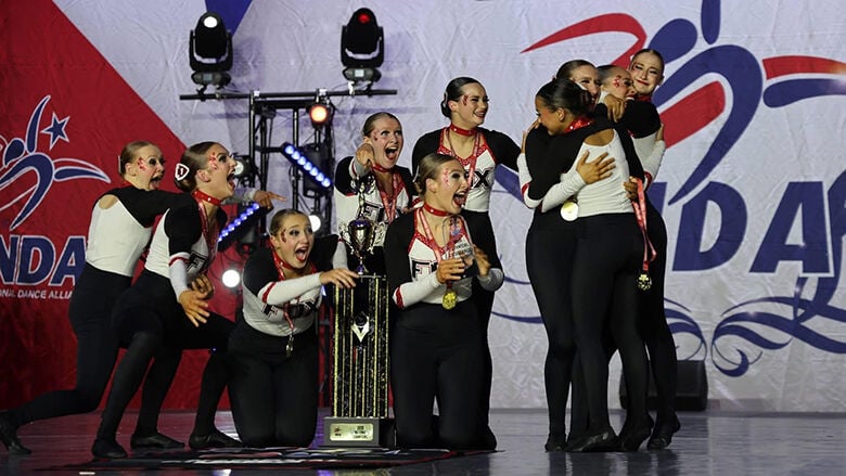 Fox High School dance team members, from left, Hannah Ball, Jesi Bretz, Ella Blase, Abbi Roberts, Taylor Schwalbe, Jaci Gordon, Lacey Rosenberg, Layla Schutte, Kya Johnson and Juliet Booker celebrate winning the small varsity Game Day title at the Natio...