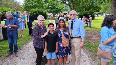 Church organist Mark Trautwein with his wife Donna, daughter Niki Volgelsang  and Niki's son Conner Volgelsang at Grace Presbyterian’s 100th anniversary celebration.