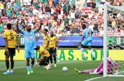DR Congo defender Axel Tuanzebe (right) celebrates his extra-time winner against Jamaica in a 2026 World Cup playoff in Guadalajara