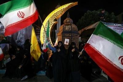 Demonstrators rally in support of Iran's supreme leader Ayatollah Mojtaba Khamenei at Sadeghyeh Square in Tehran on April 27, 2026