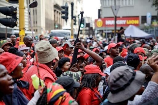 EFF supporters gathered outdoors to watch the sentencing live