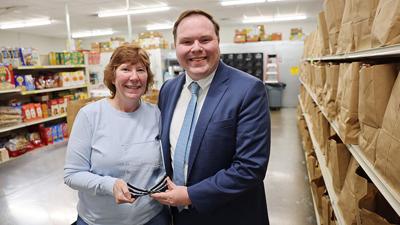 Gateway Food Pantry executive director Patrick McKelvey, right, with his mother and pantry executive assistant, Stephanie McKelvey. Patrick was named the 2025 Don Earl Citizen of the Year by the Arnold Chamber of Commerce.