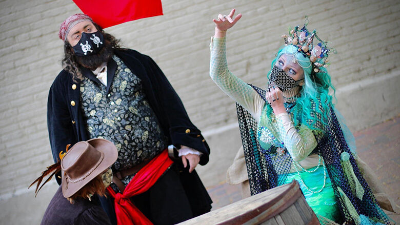 Podcast co-creators Mark Killmer and Carole Ann Miller dress as Blackbeard and a siren for the Legends & Lanterns festival in St. Charles.