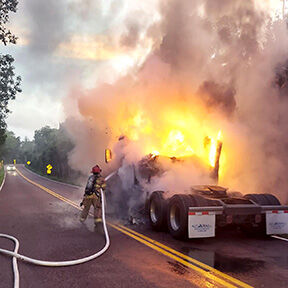 Tractor-trailer stopped along Hillsboro-area road damaged in blaze