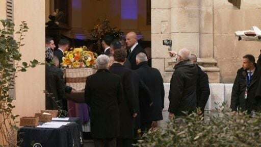 Brigitte Bardot's wicker coffin arrives at Saint-Tropez church