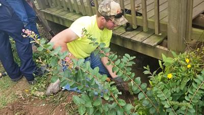 De Soto Rural firefighters dug out a dog trapped under a house.
