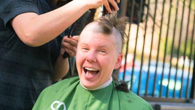 head-shaving-event-registration-2017-header-woman-shavee-smiling.jpg