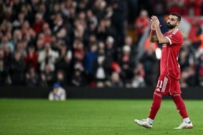 Mohamed Salah applauds as he leaves the pitch after being substituted during Liverpool's Champions League match against Galatasaray