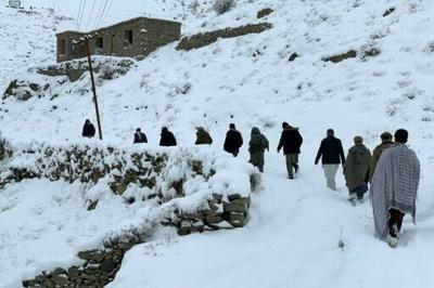 Snow and heavy rain have killed 61 people over three days in Afghanistan, with roads and a major power line also cut