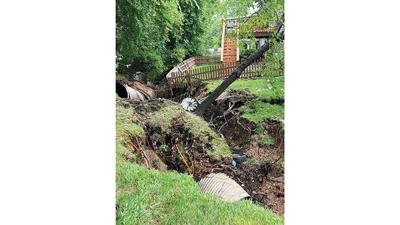 A sinkhole formed at Woodridge Estates in Arnold.