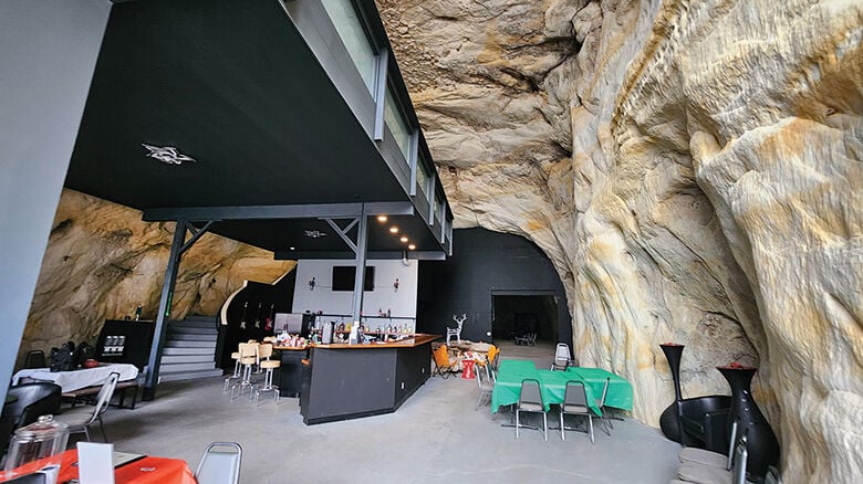 Steps at left lead up to the bedrooms, bathrooms and lounge area.