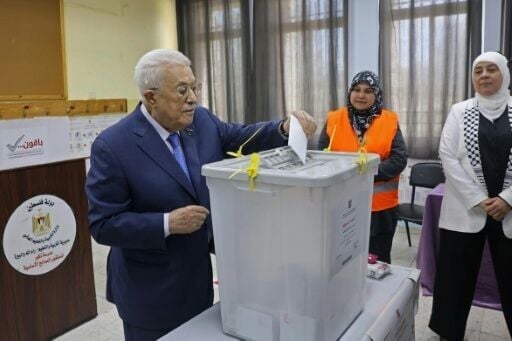 After casting his vote in El Bireh, Palestinian president Mahmud Abbas hailed the people's exercise of democracy under difficult conditions