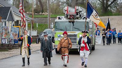 Phil Stang, second from left, leads last year’s Welcome Home Vietnam Veterans Parade in Kimmswick.