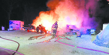 A camper was destroyed and propane tanks exploded in a fire in rural De Soto.