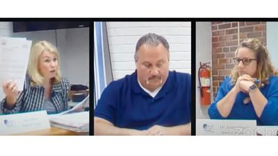 From left, Suzy Davis, Tim Pigg and Amber Henry during the April 27 Health Department board meeting in which Davis was censured for a second time.